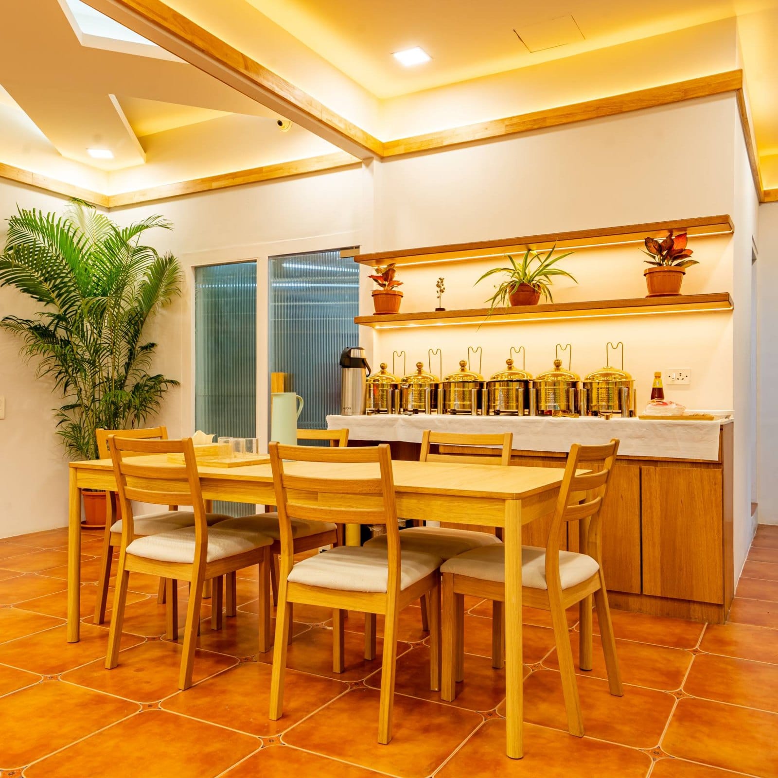 Pantry with a serving counter and dining table