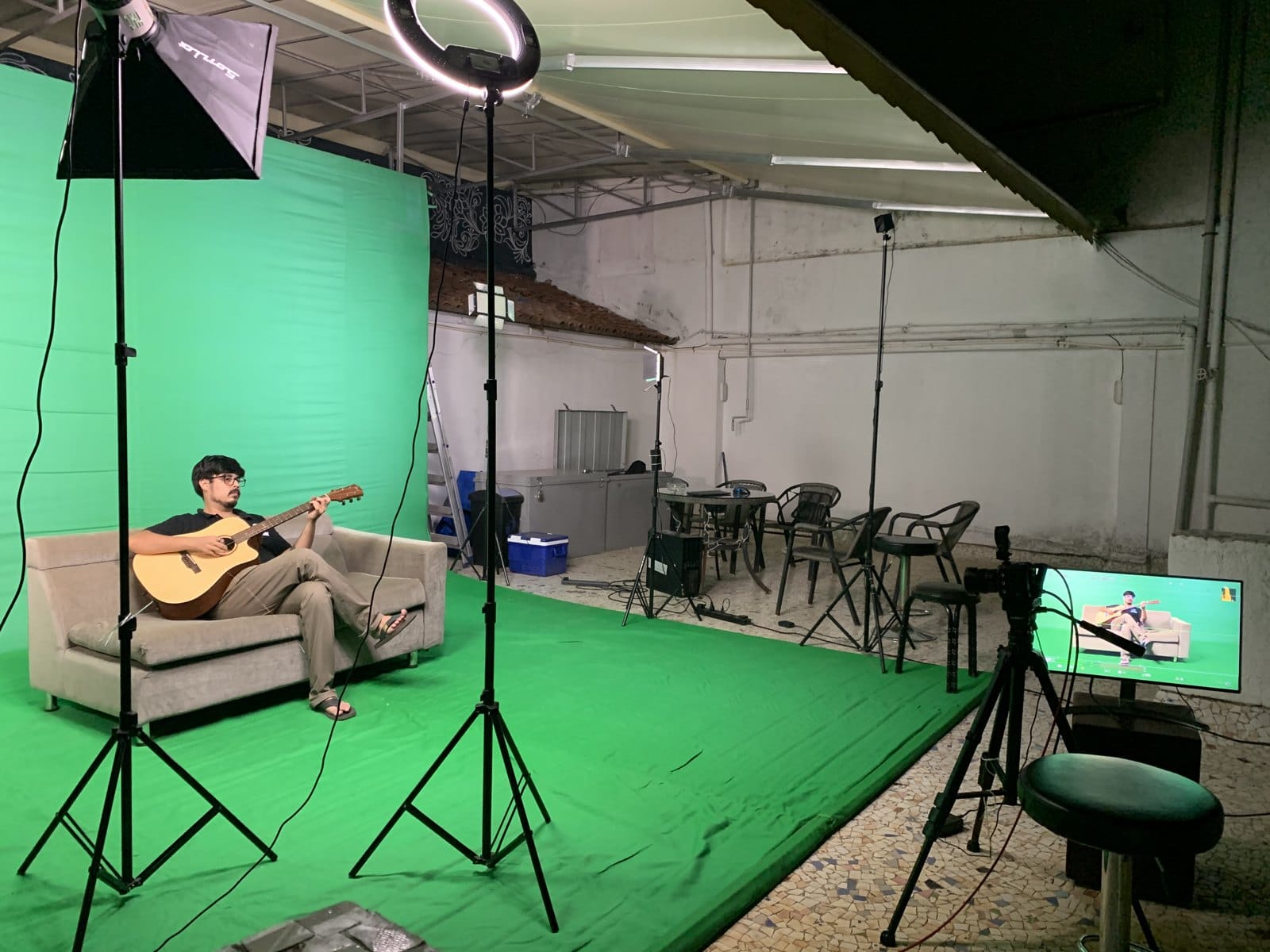 A guitarist recorded on the chroma stage
