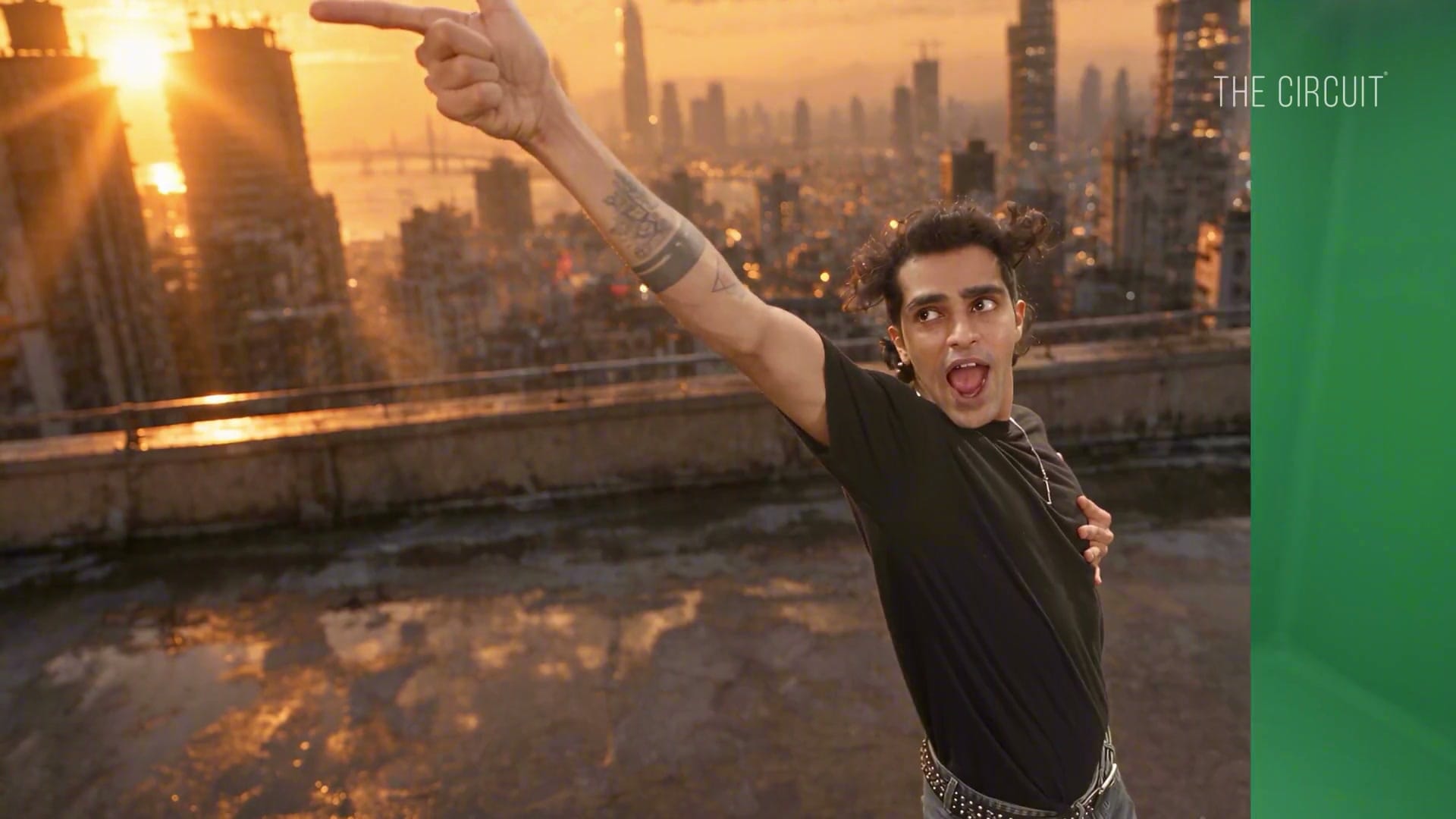 Performer on a Mumbai rooftop at sunset, built in post